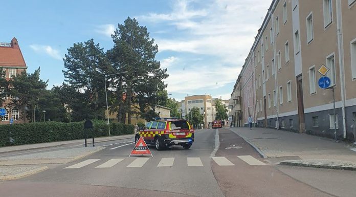 Olja fattade eld på spis